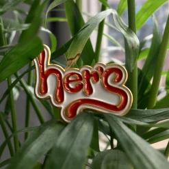 New Merch Her's Logo Pin